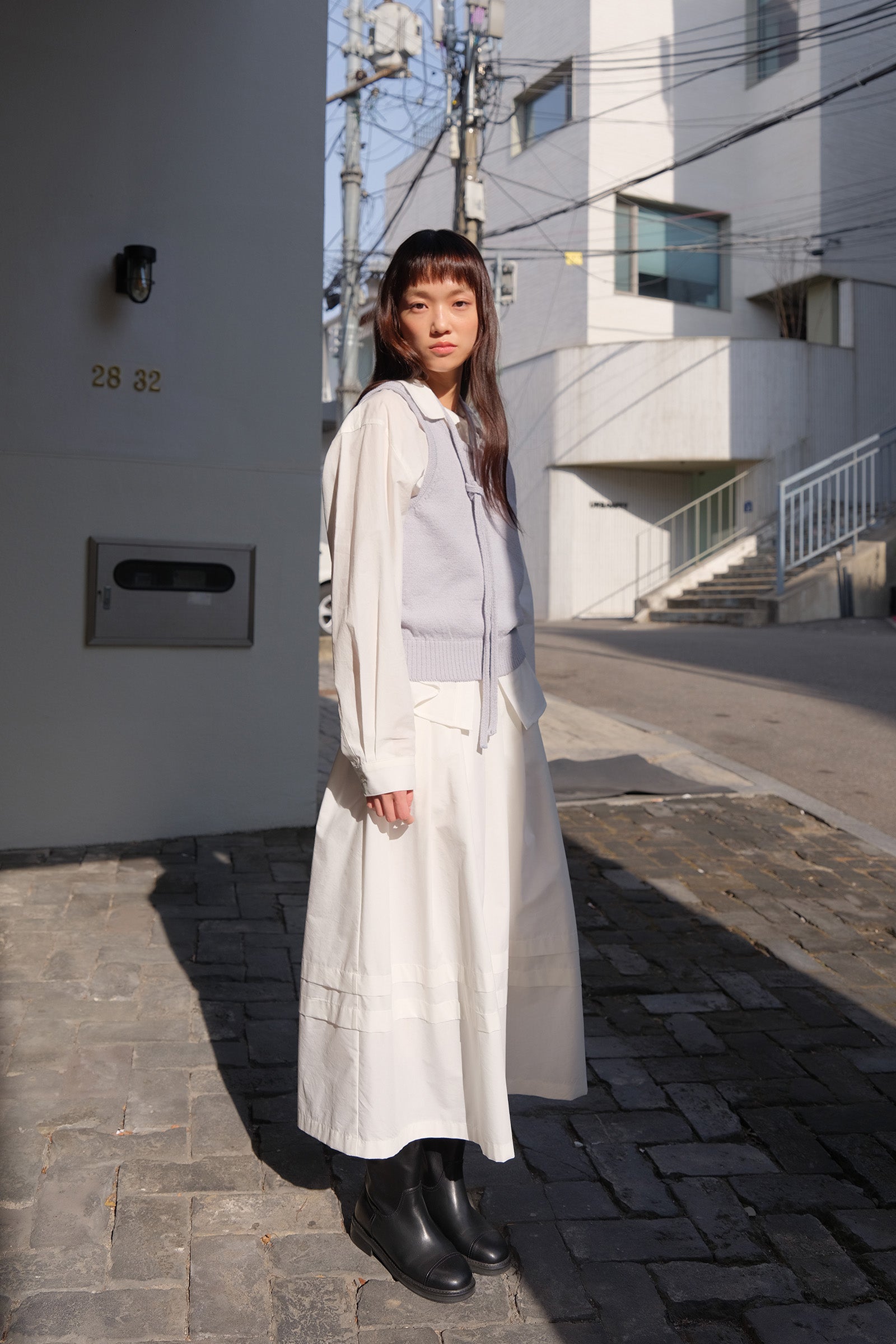 MOUI RIBBON PLEATS SKIRT_OFF WHITE
