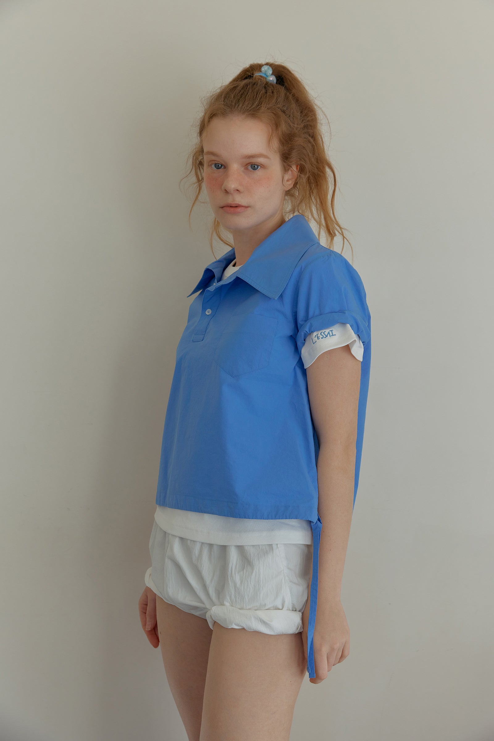 25SS ASYMMETRY COLLAR POLO CROP SHIRT_BLUE