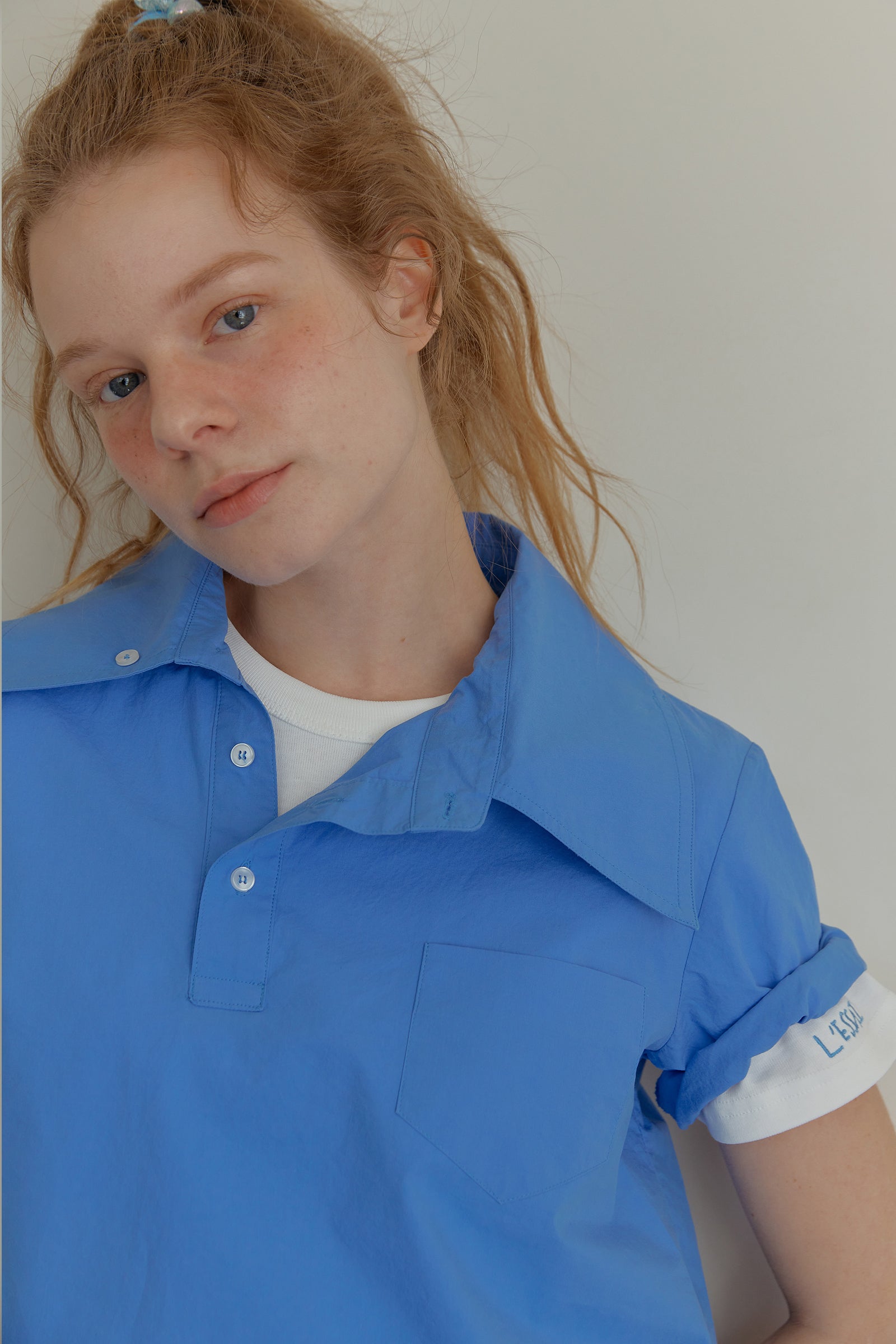 25SS ASYMMETRY COLLAR POLO CROP SHIRT_BLUE