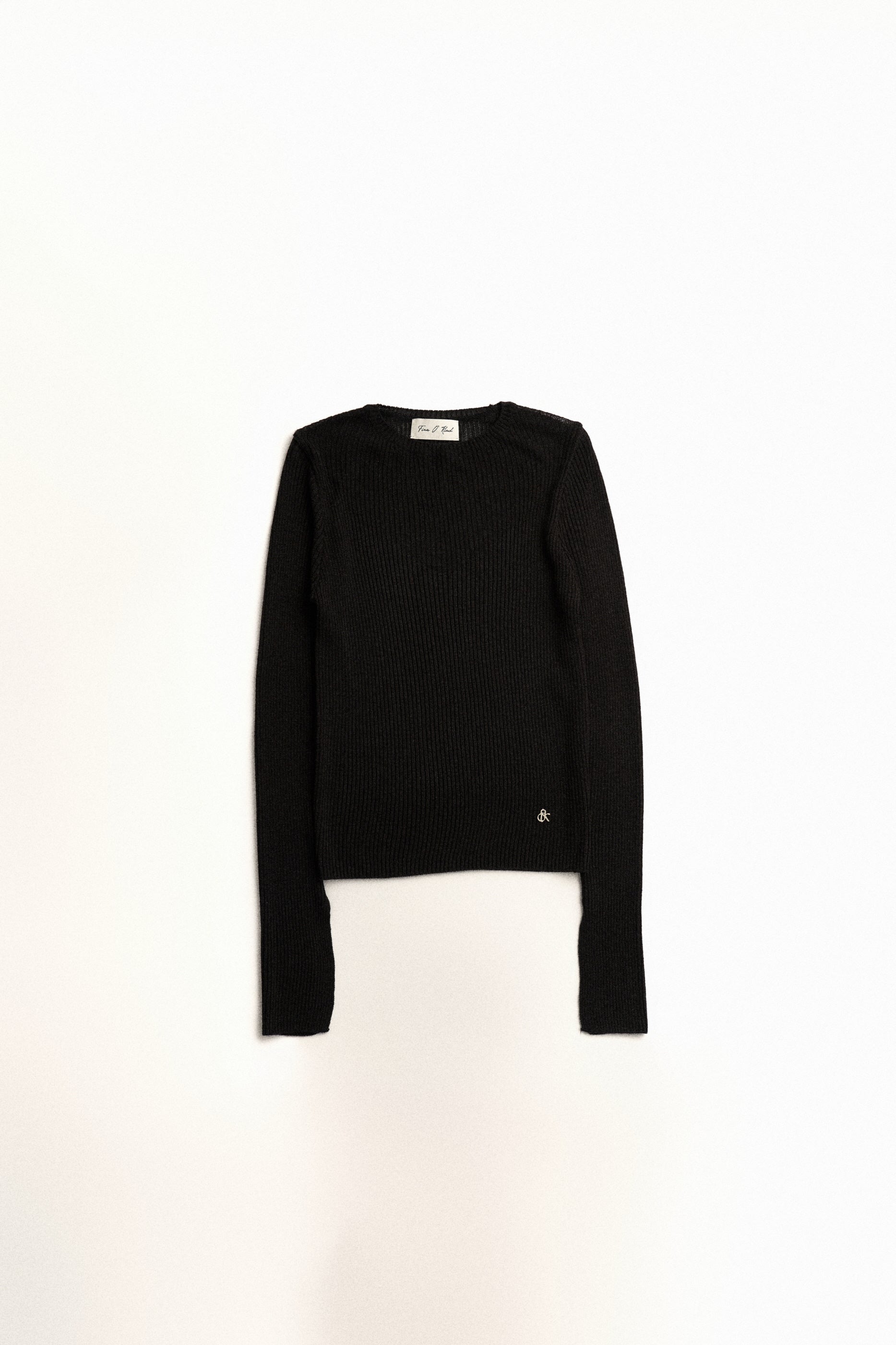 PULL TRANSPARANT À COUTURES BRUTES_NOIR