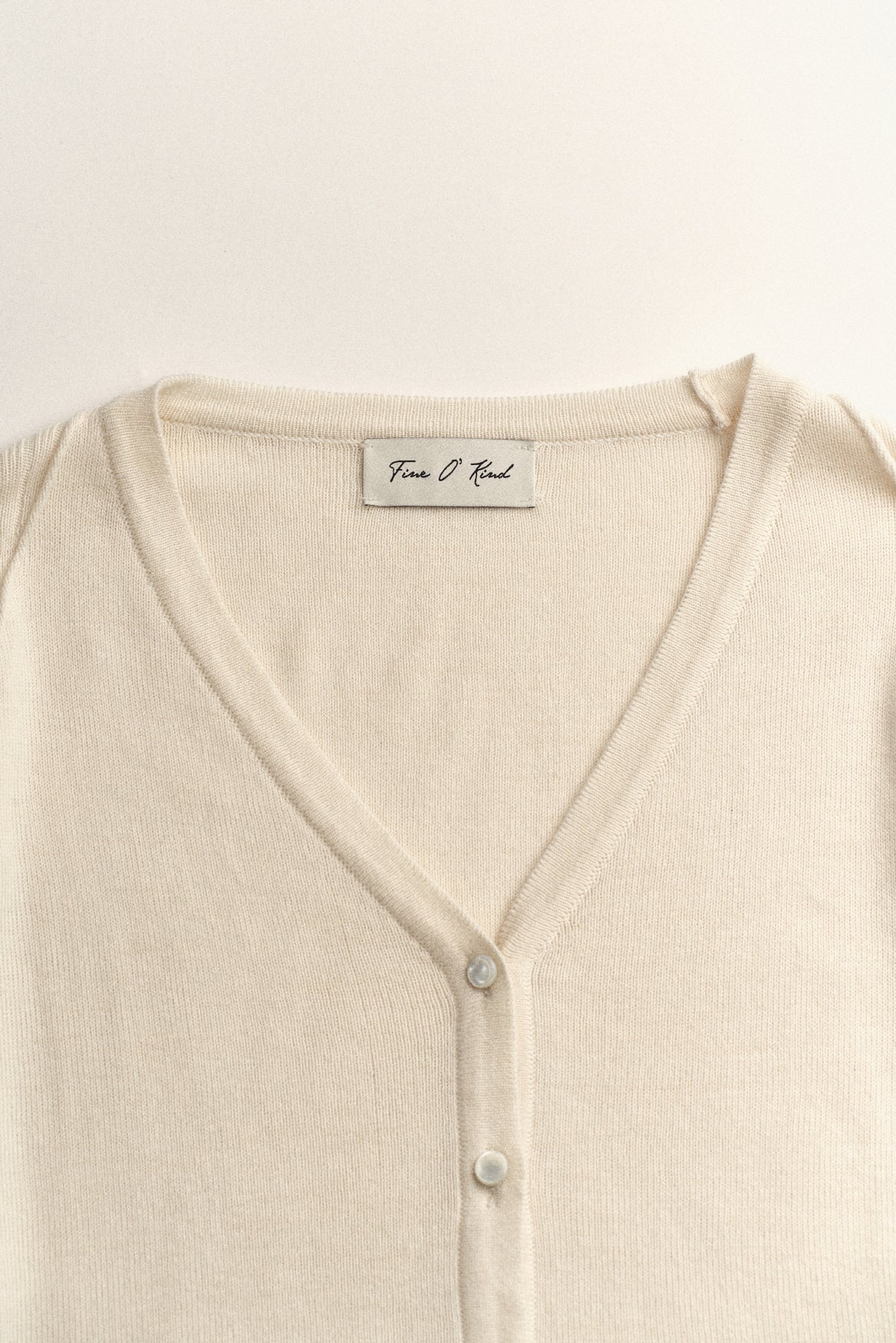 CARDIGAN À COUTURES BRUTES_IVOIRE