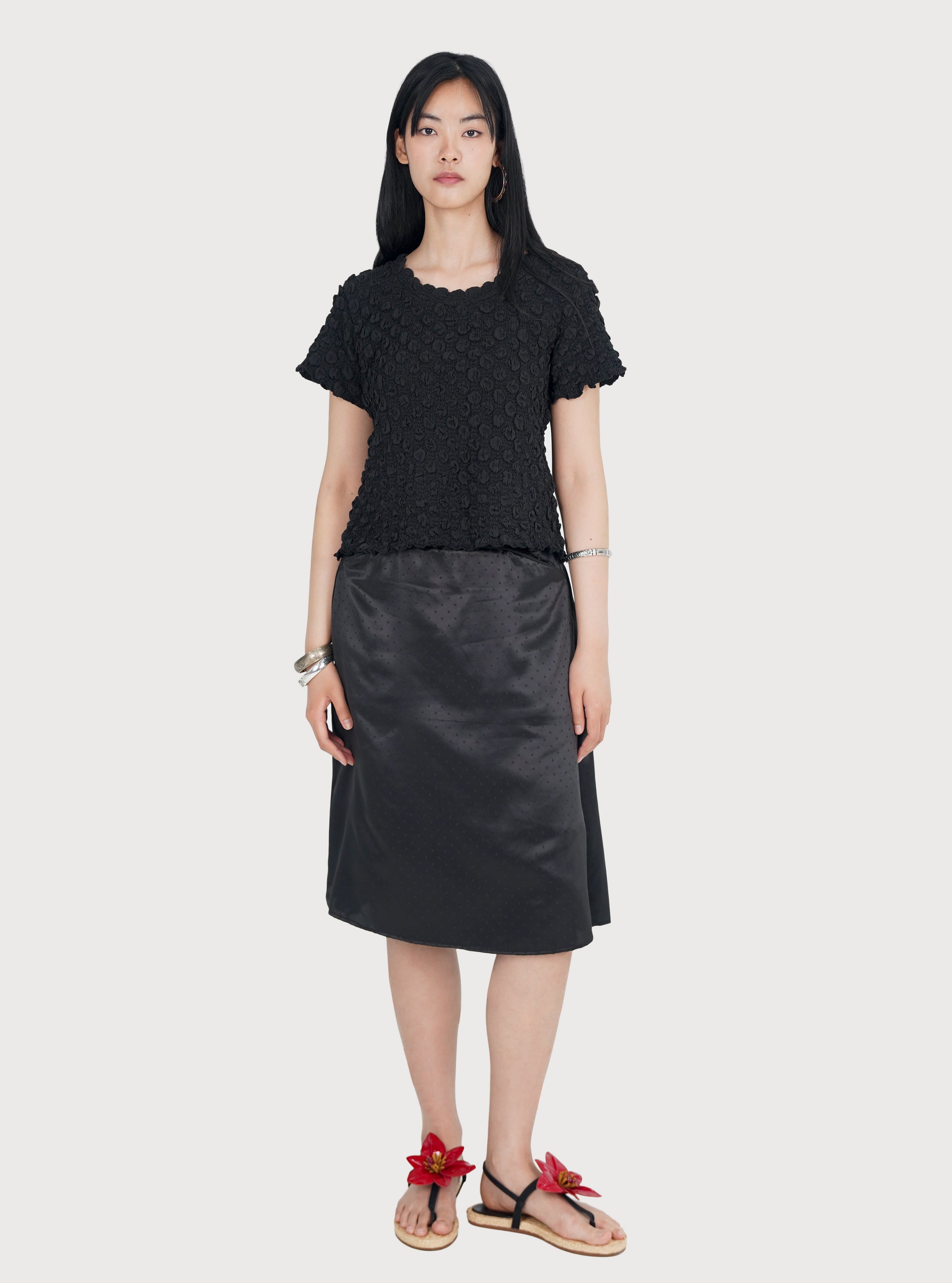 JUPE MIDI À POIS SATINÉE_NOIR