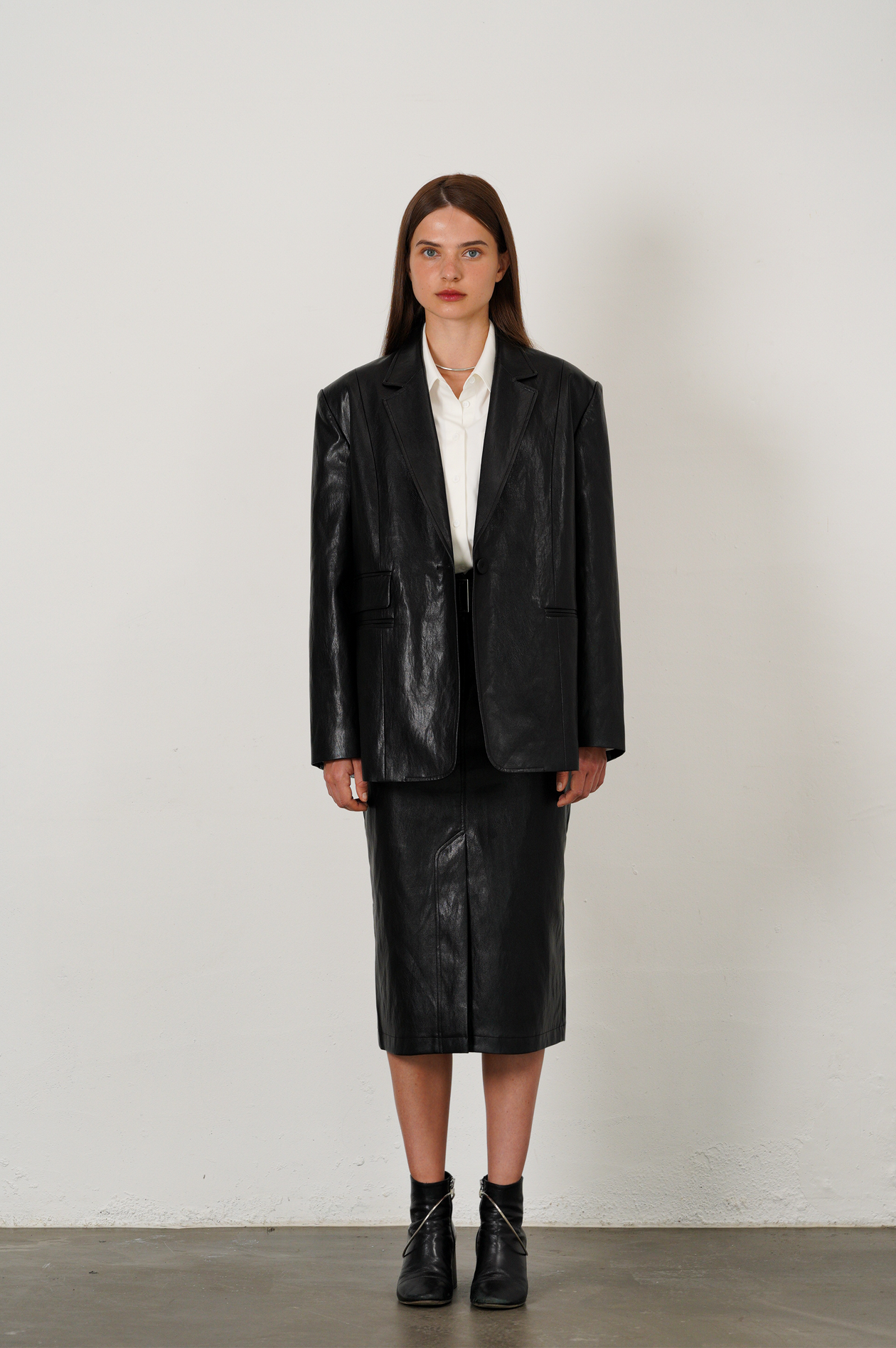 JUPE TAILLE HAUTE EN SIMILI CUIR_NOIR